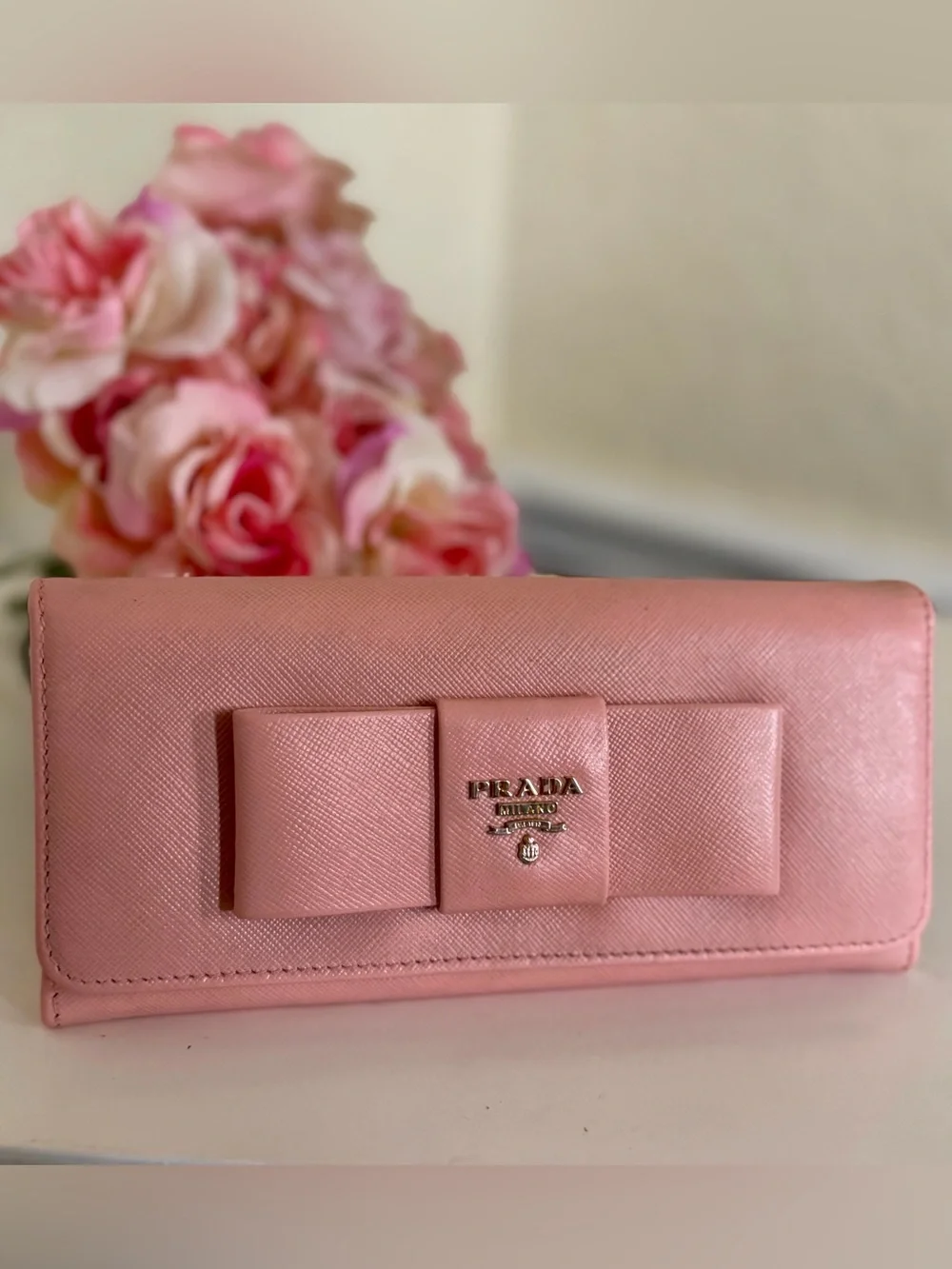 Pink Prada Saffiano leather long wallet flap closure with bow